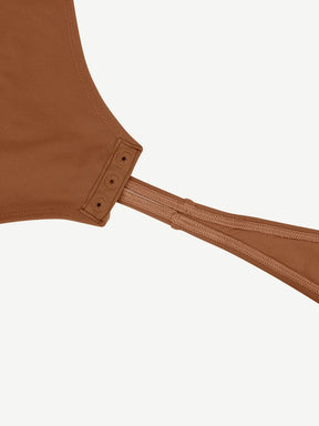 Body de tanga de manga larga con escote en V y cintura alisada