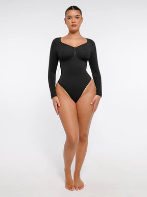 Body de tanga sin costuras de manga larga con soporte para el pecho y control medio
