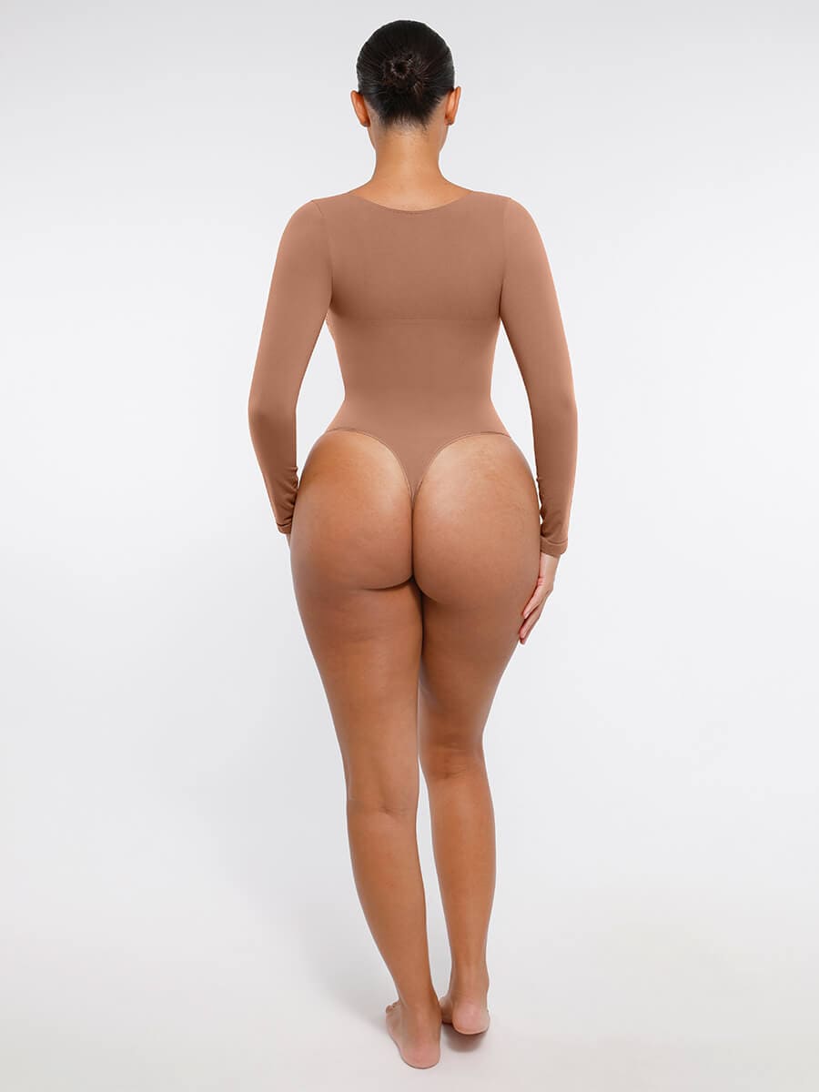 Body de tanga sin costuras de manga larga con soporte para el pecho y control medio