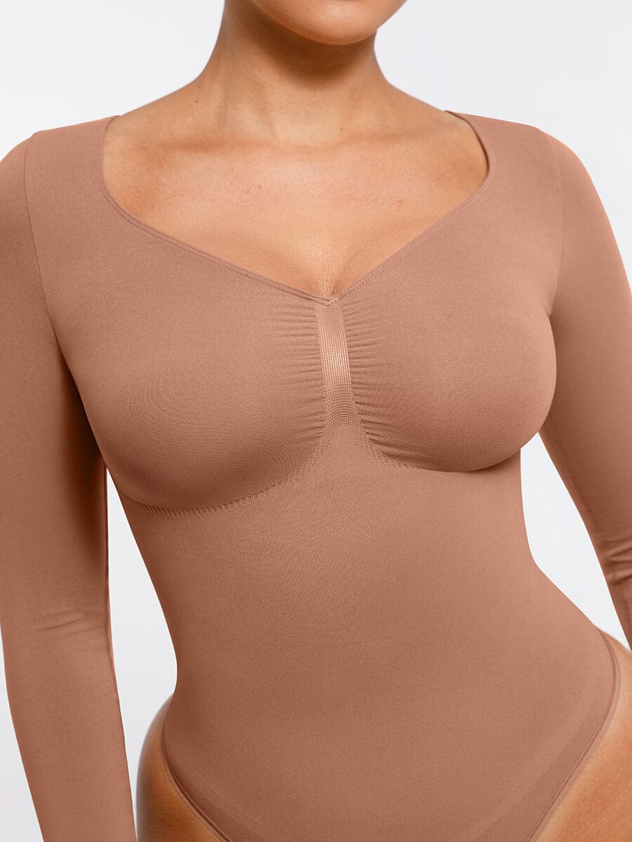 Body de tanga sin costuras de manga larga con soporte para el pecho y control medio