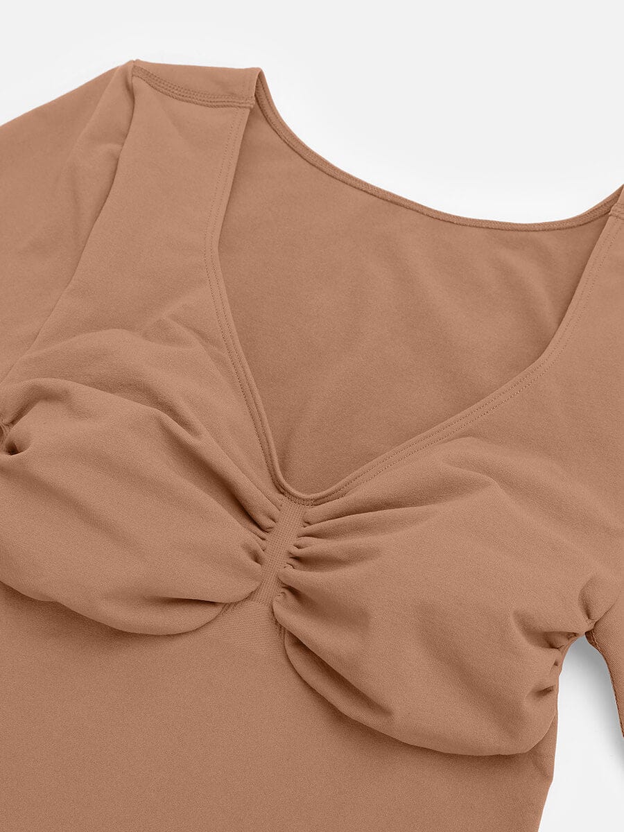 Body de tanga sin costuras de manga larga con soporte para el pecho y control medio