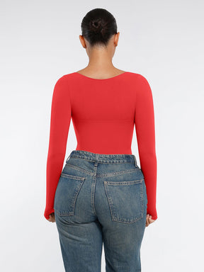 Body de tanga sin costuras de manga larga con soporte para el pecho y control medio