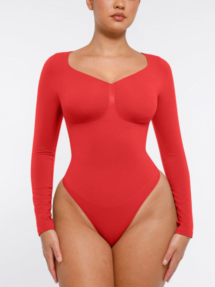 Body de tanga sin costuras de manga larga con soporte para el pecho y control medio